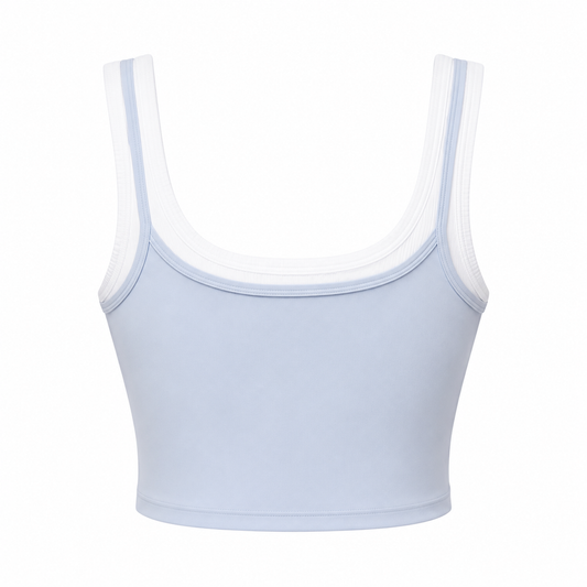Light blue sports bra with thin straps on a white background