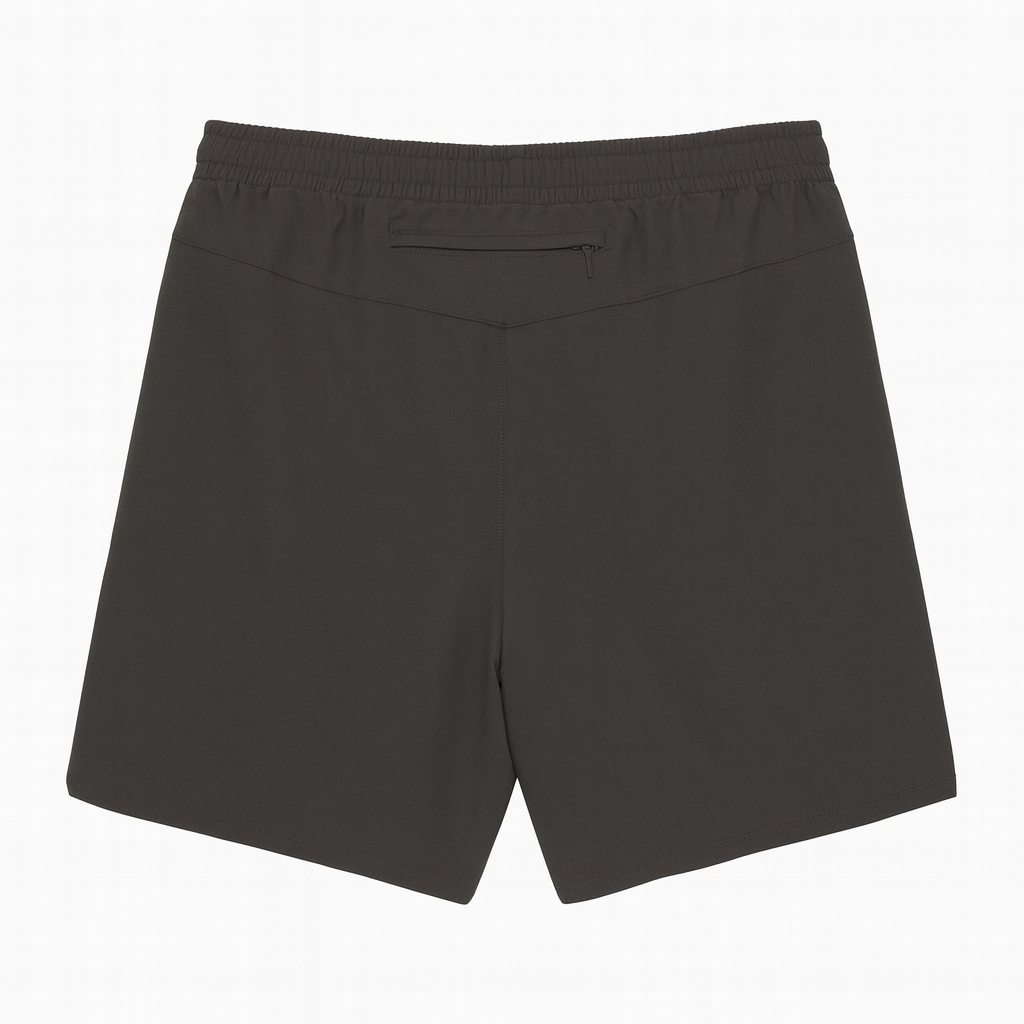 Black shorts with zipper on back straight across on a white background 