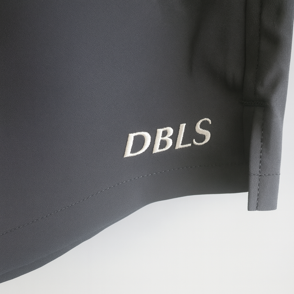 Dark gray fabric with 'DBLS' logo written in cream