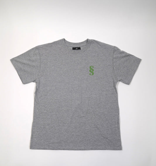 A gray oversized t-shirt with a small green 'SS' logo on the chest.